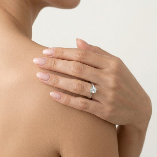 Elegant twist solitaire ring for women