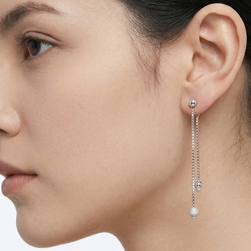 White gold earrings with a hanging balls