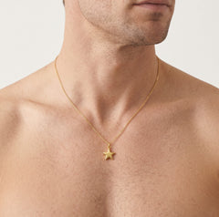 Gold star pendant