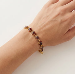 Pulsera con dije de flor de granate