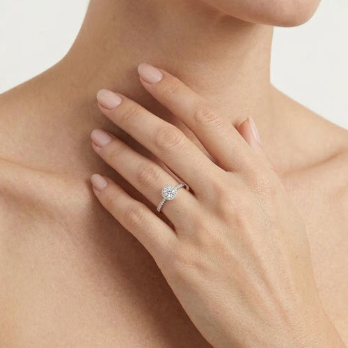 Shiny white gold ring with diamonds