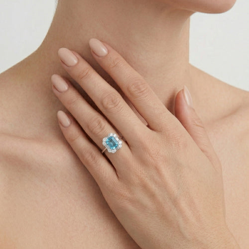 Halo cushion cut blue topaz ring