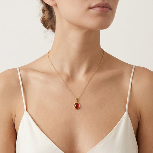 Pendentif en or avec cabochon ovale