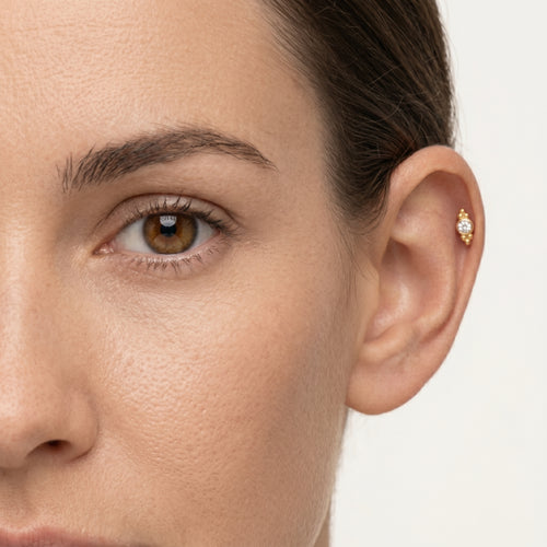 Piercing en or élégant avec zirconium serti clos