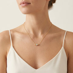 Minimalist gold necklace with 3 balls