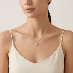 Gold necklace with rectangular zircon