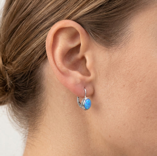 Drop earrings with oval blue opal