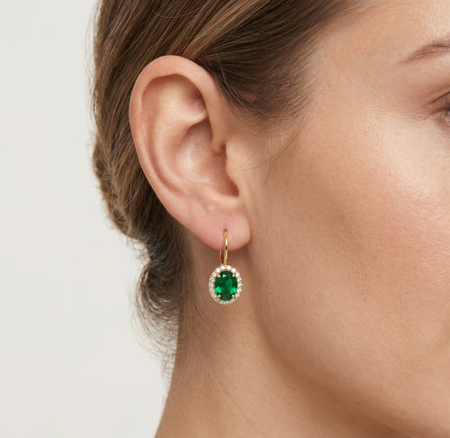 Oval cut emerald halo earrings