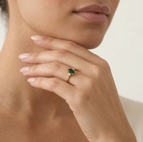 Oval cut green synthetic emerald ring