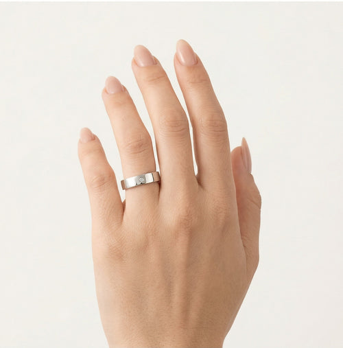 Anillo de boda ancho con solitario de platino