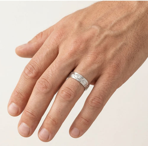 White gold wedding ring with cross carved lines