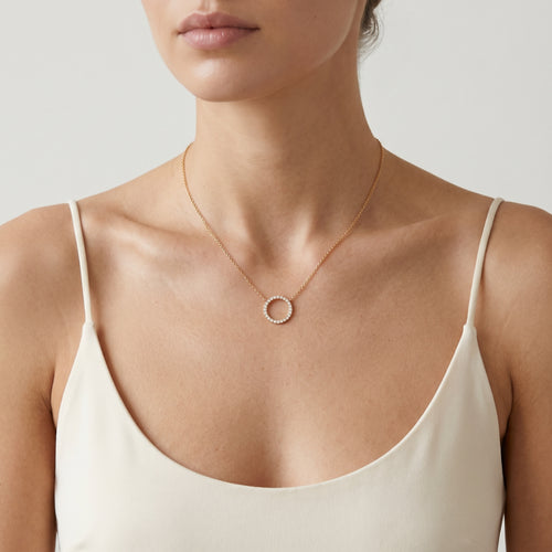 Collier en or rose avec anneau en zircon