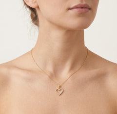 Dazzling heart pendant with cubic zirconia on both sides