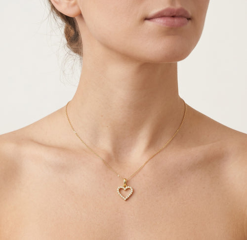 Dazzling heart pendant with cubic zirconia on both sides