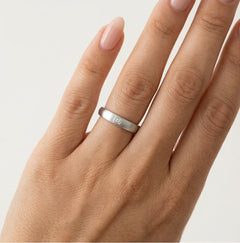 Matte finish white gold wedding ring with princess cut stone