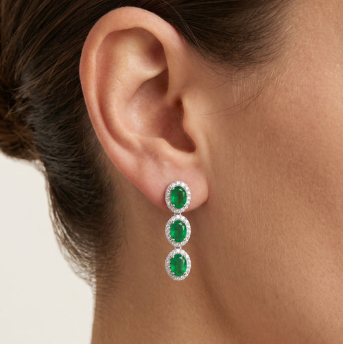 Halo drop earrings with emerald