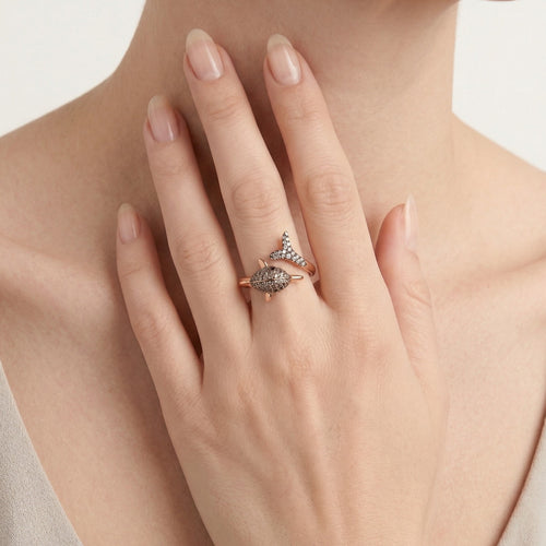 Three tone diamond dolphin ring