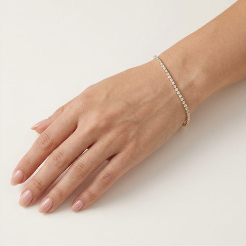 Náramek ze žlutého zlata s kubickými zirkony