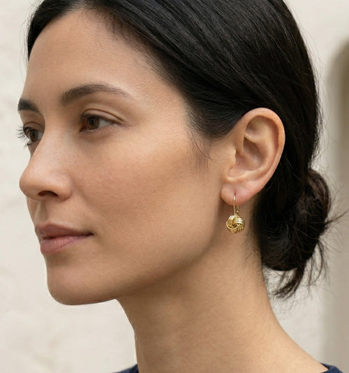 Knotted drop gold earrings