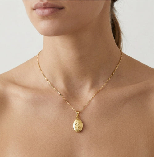 Yellow gold medallion pendant