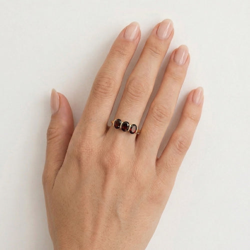 Radiant triplet yellow gold oval trio ring