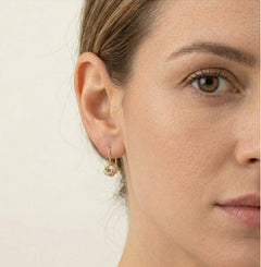 Boucles d'oreilles pendantes en or uniques avec nœud