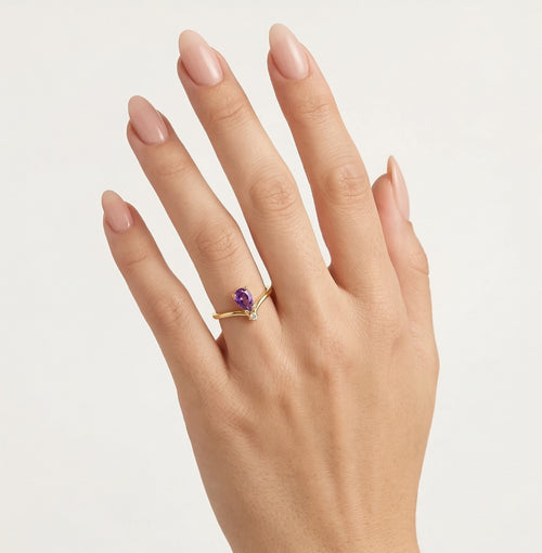 Pear-cut purple amethyst cubic zirconia yellow gold ring