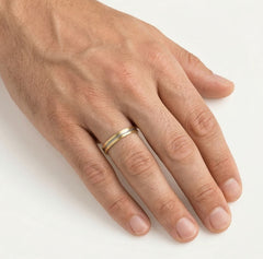 Yellow gold wedding band with white accents