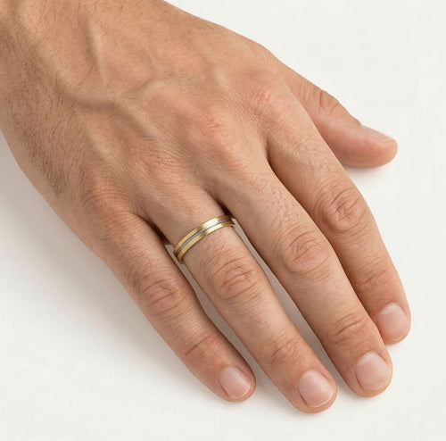 Yellow gold wedding band with white accents