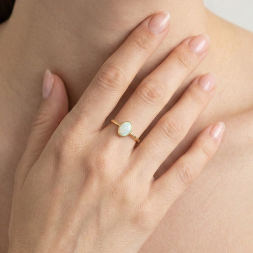 Simple white opal gold ring