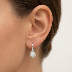 White opal drop earrings with royal cubic zirconia