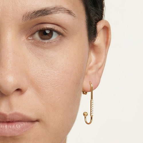 Unique gold earrings with ball and zircons