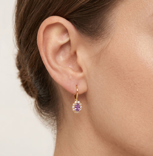 Boucles d’oreilles halo en or jaune avec améthyste violette taille ovale