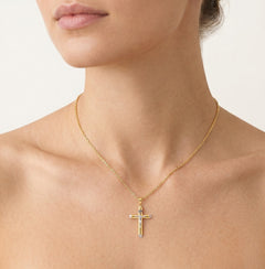 Colgante cruz bicolor con la figura de Jesucristo