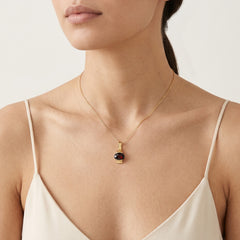 Pendentif solitaire en grenat taille ovale