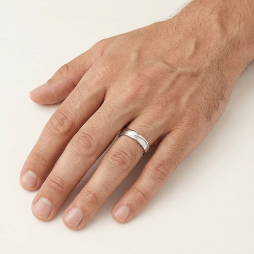 White gold wedding ring with curved matte line