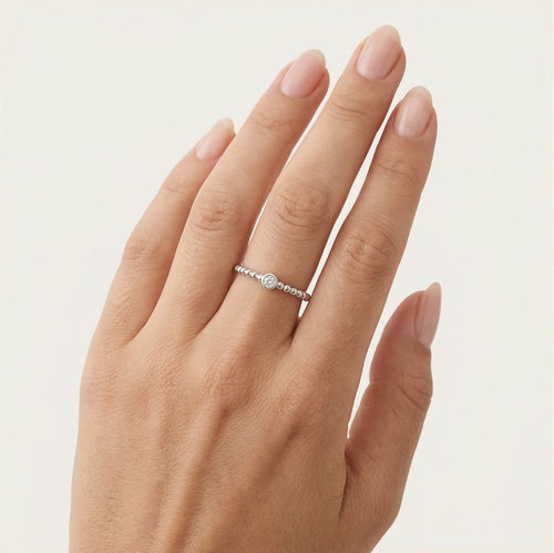 Diamantring aus Weißgold mit lebendigem Design