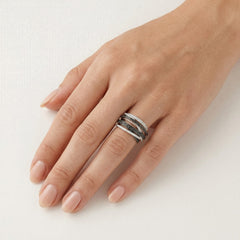 Elegant women ring with black and white diamonds