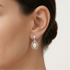 Unique gold earrings with diamond frame and pearl