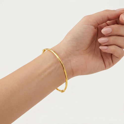 Brazalete fino de oro rígido