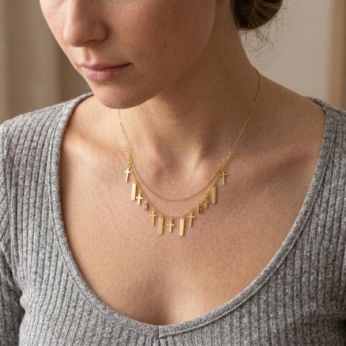 Gold necklace with two chains and ornaments