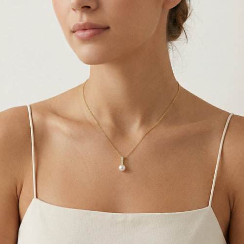 colgante de oro con perla destacada