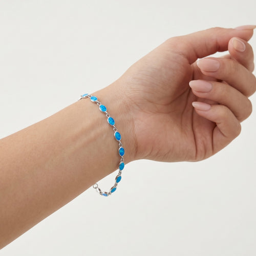 Stříbrný náramek s modrým opálem