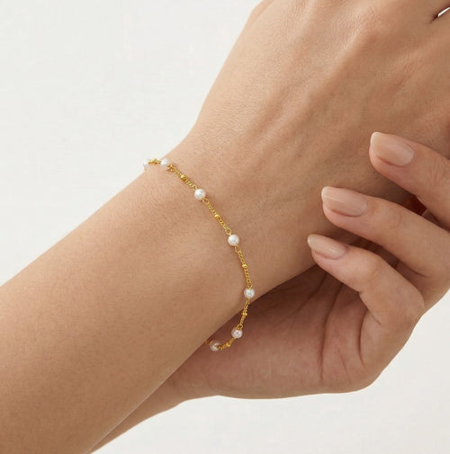 Pulsera cadena de oro con once perlas