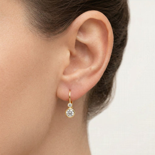Ohrringe aus Gold mit Zirkonia in Zargenfassung