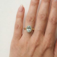 Massive oval blue topaz gold ring