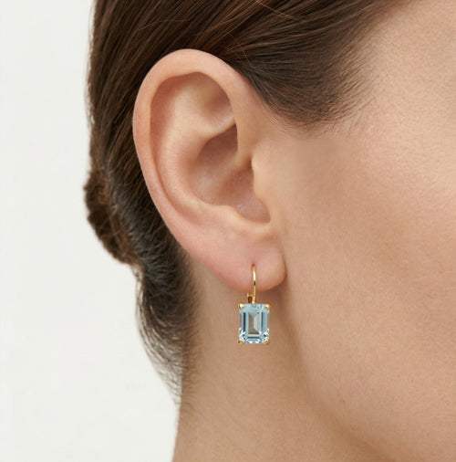 Zlaté náušnice s modrým topazem