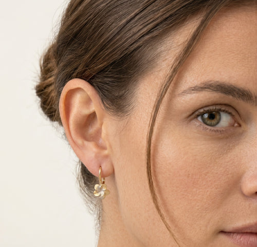 Floral drop earrings in yellow gold