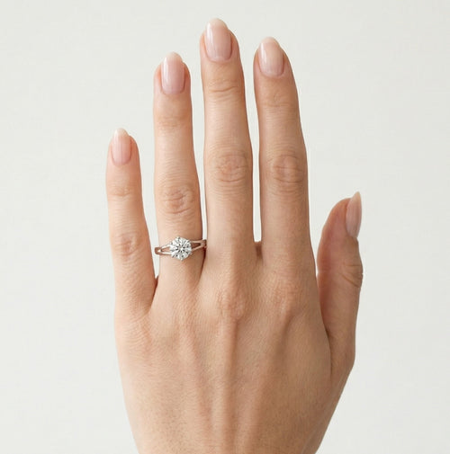 Classic white gold ring with exposed cubic zirconia