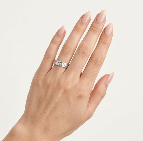 White gold wedding ring with cross carved lines